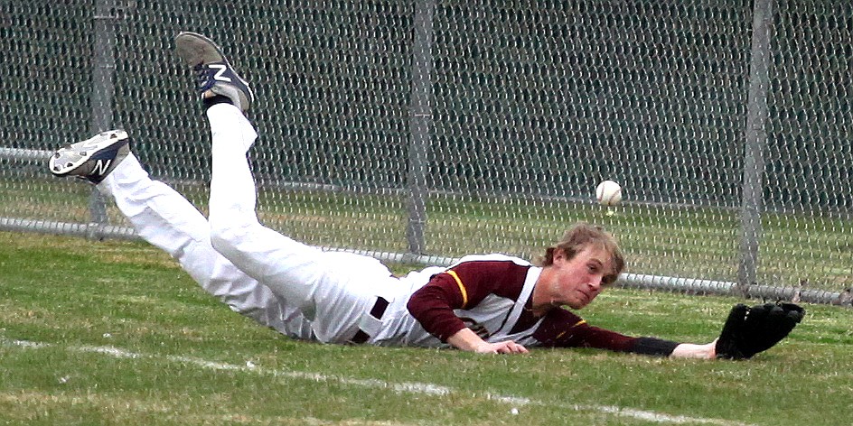 Rodney Harwood/Columbia Basin Herald
Moses Lake right fielder Josh Williams makes a diving attempt to catch a foul ball down the right field fenceline during Tuesday's Big Nine game against Eastmont. The Chiefs beat the Wildcats 5-1.