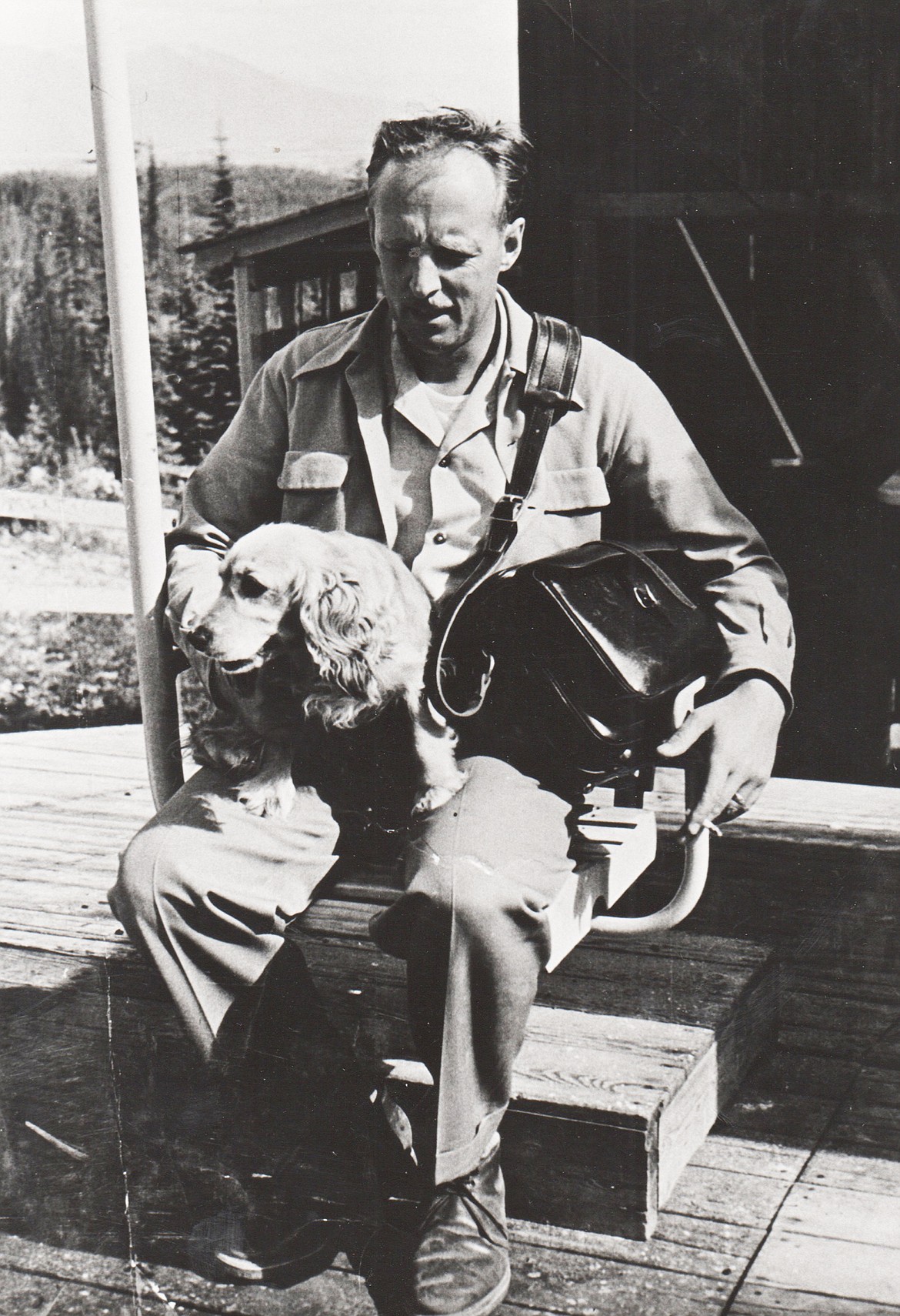 Ed Schenck relaxes with the family dog in this Schenck family photo.