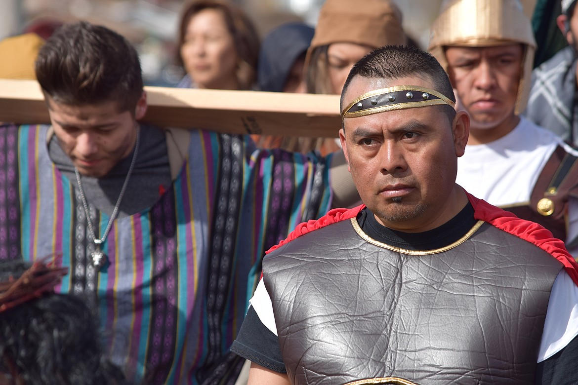 Charles H. Featherstone/Columbia Basin Herald
A Roman soldier looks on at the Passion procession at Sacred Heart Catholic Church in Othello Friday.