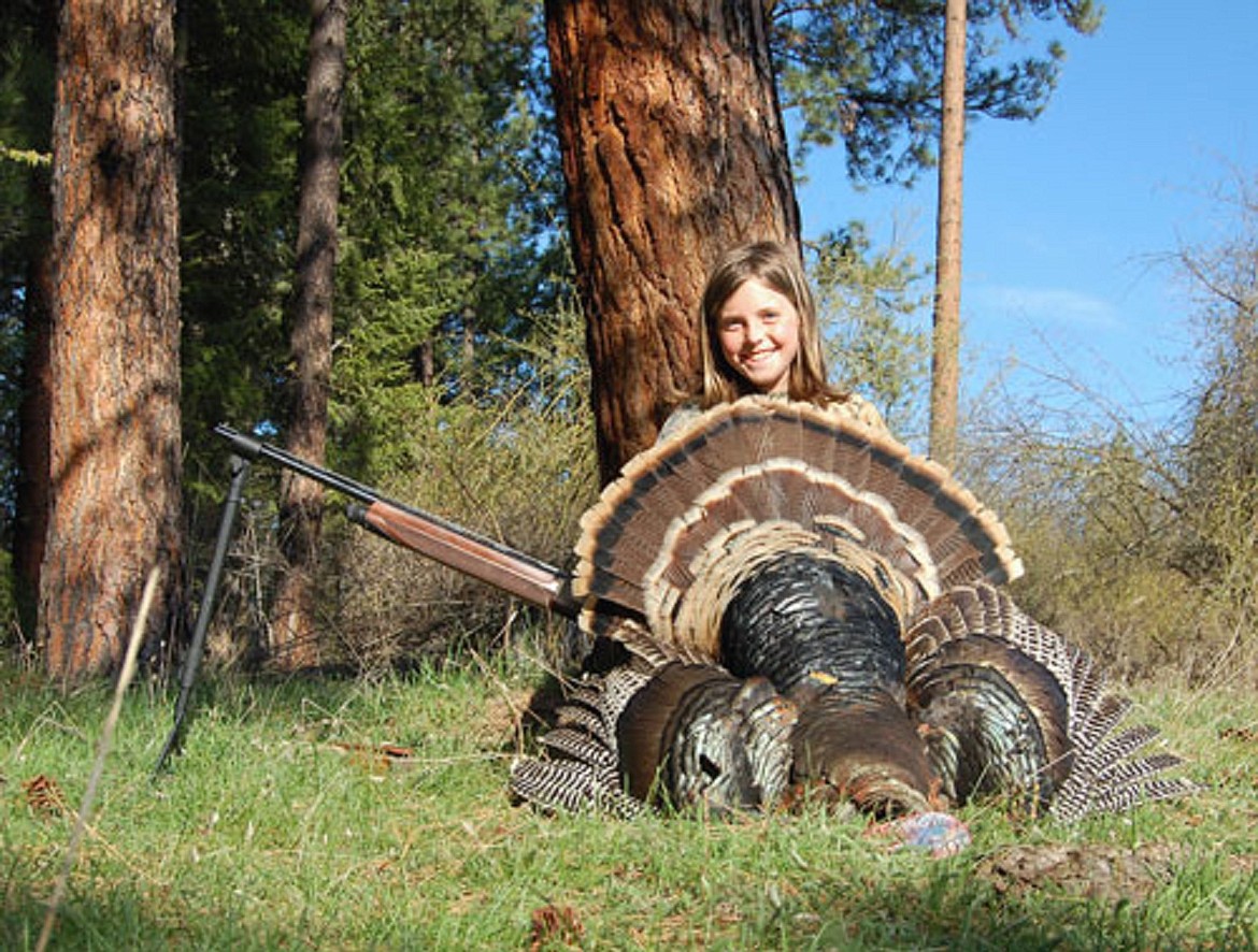 (Photo courtesy of IDAHO DEPARTMENT OF FISH AND GAME)
A young Idaho hunter poses with a tom turkey killed during an early youth hunt. Youth turkey season starts April 8 in the Panhandle.