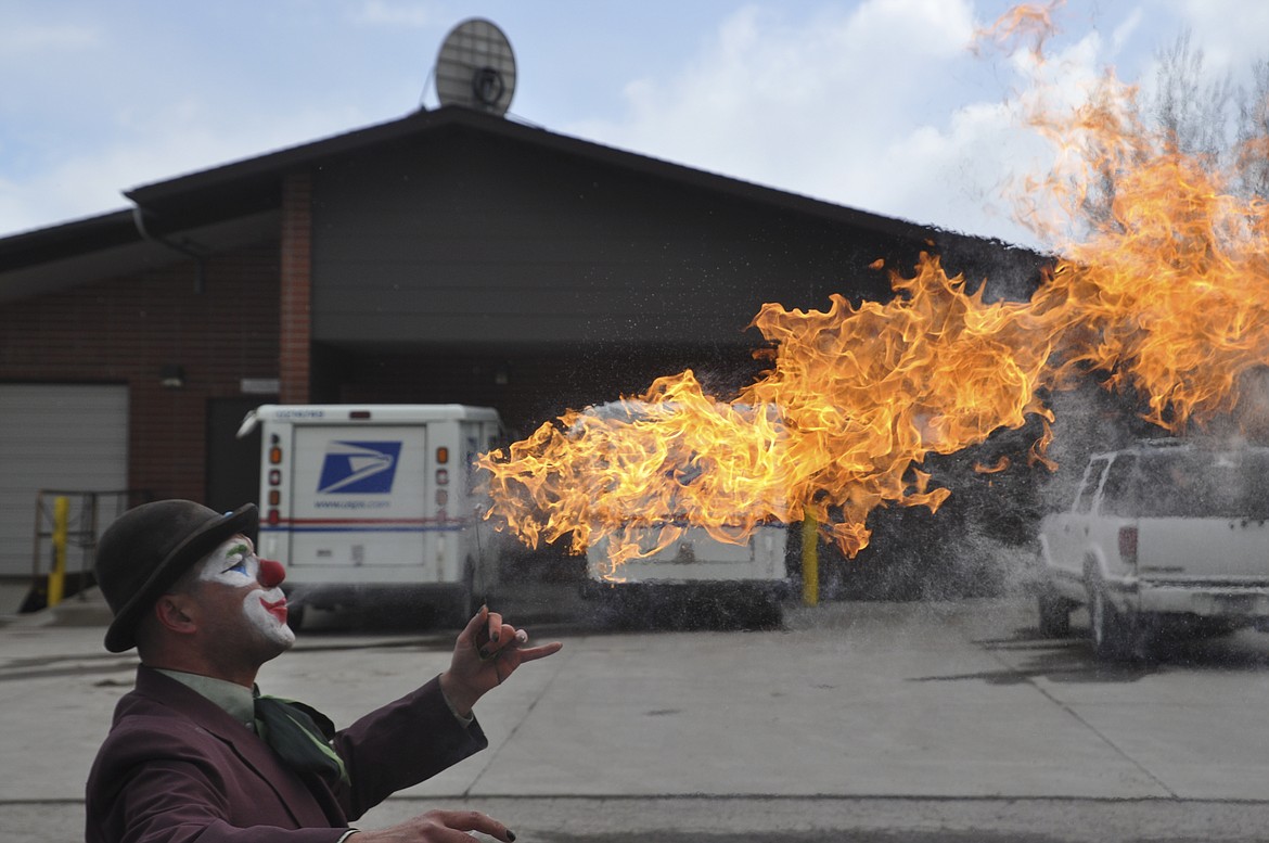 FIRE BREATHING is Travis Bynum&#146;s favorite part of his &#147;Bobo the Hobo&#148; performance. Bynum also does juggling and makes balloon animals, among other talents when he&#146;s in character. (Ashley Fox/Lake County Leader)