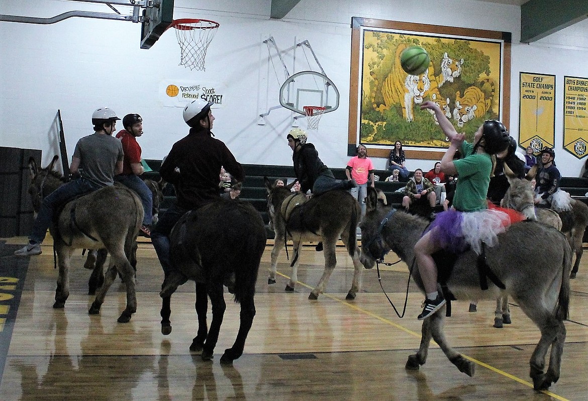 A tutu player for two during the donkey game where Superior students faced off against Superior staff. Staff won, 6 to 4.