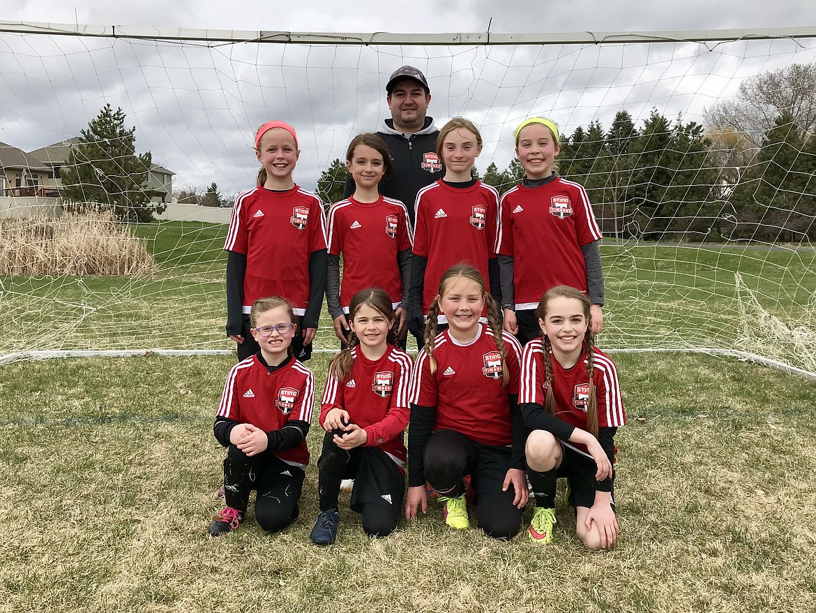 Courtesy photo
The Sting Timbers FC Girls 08 Green soccer team beat Spokane Foxes Pumas FC 08 Ives on Saturday 4-0. Izabella Entzi and Cameron Fischer each had 2 goals. Savannah Spencer and Isabella Grimmett teamed for the shutout in goal for STFC. On Sunday STFC Green beat the Tri-Cities ASE 08 Bauder 1-0. Nora Ryan had the goal off of a penalty kick. Savannah Spencer and Izabella Entzi again teamed for the shutout in goal for STFC. In the front row from left are Ashley Breisacher, Savannah Spencer, Anna Ploof and Sloan Waddell; and back row from left, Nora Ryan, Isabella Grimmett, Cameron Fischer, Izabella Entzi and coach Tony Grimmett.