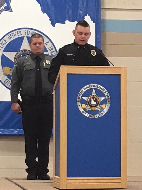 (Courtesy photo) 
Sandpoint Police Officer Zachary Fisher, right, graduated from the Idaho Peace Officer Standards and Training Academy on March 30. The academy is in Meridian and lasts ten weeks.  It also meant ten weeks away from family. 
&#147;We are excited to have Officer Fisher back and serving our community as a commissioned member of our police department,&#148; City Administrator Jennifer Stapleton said in a statement. 
In addition to Fisher&#146;s accomplishment, the city&#146;s Wastewater Treatment Plant supervisor, Deven Hull, not pictured, passed his Idaho Grade 4 operator exam last week.  This is the highest level of certification for wastewater treatment, and Sandpoint is required to have a Grade 4 operator at its plant. This level of certification requires both education and proven experience in wastewater treatment and requires that the operator pass the Grades 1, 2 and 3 exams before being eligible to sit for the Grade 4 exam.