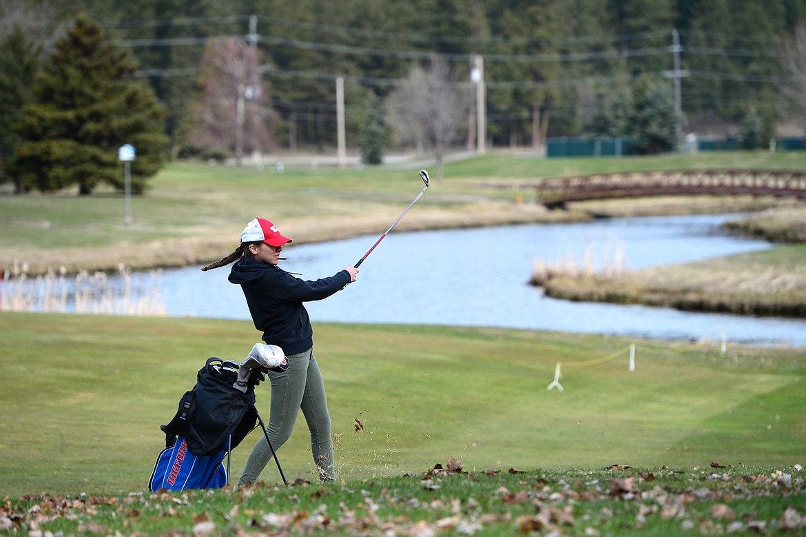 Bigfork&#146;s Isabella Santistevan plays her second shot on hole No. 1 at Eagle Bend Golf Club in Bigfork on Thursday. (Casey Kreider/Daily Inter Lake)