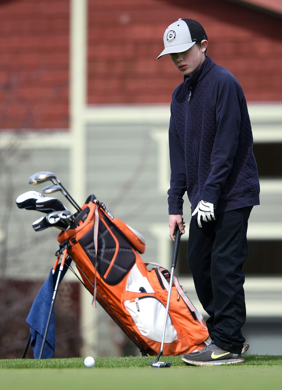 Eureka&#146;s Kaden Benford leaves his putt just short of the cup on No. 14 at Eagle Bend Golf Club in Bigfork on Thursday. (Casey Kreider/Daily Inter Lake)