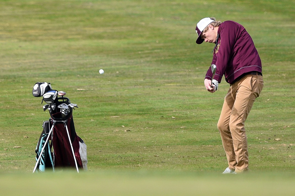 Shelby&#146;s T.J. Reynolds plays his third shot on hole No. 2 at Eagle Bend Golf Club in Bigfork on Thursday. (Casey Kreider/Daily Inter Lake)