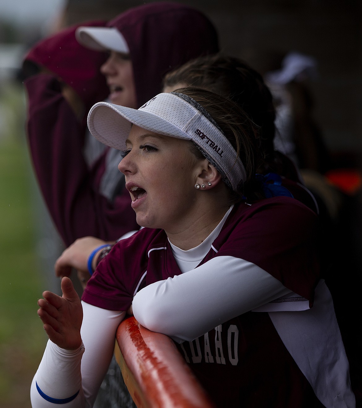 Megan Carver of North Idaho College cheers for her teammate at bat against Big Bend.