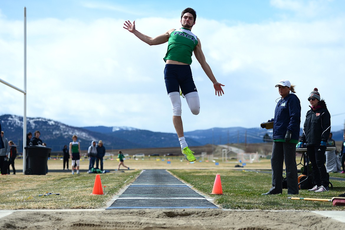 Glacier High School&#146;s Hunter Nicholson competes in the long jump in a meet against Flathead High School at Glacier High School on Tuesday. Nicholson&#146;s jump measured 21 feet 9 inches. (Casey Kreider/Daily Inter Lake)