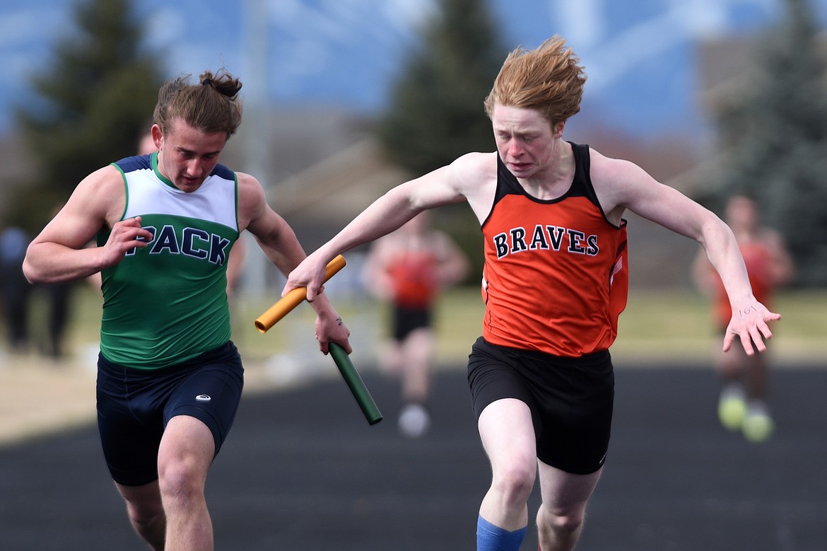 Flathead High School&#146;s Chance Sheldon-Allen finishes in the boys&#146; 4x100 meter relay during a meet with Glacier at Glacier High School on Tuesday. (Casey Kreider/Daily Inter Lake)