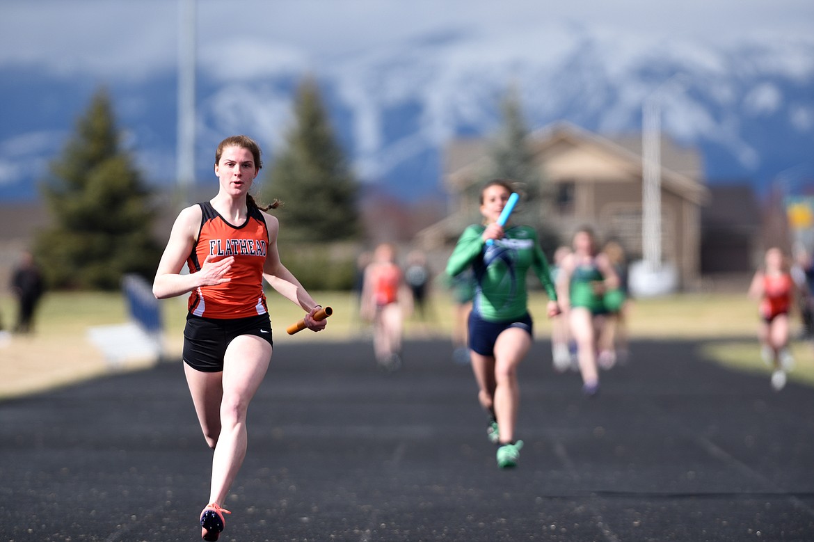 Flathead High School&#146;s Jessica Barnhart anchors the girls&#146; 4x100 meter relay team during a meet with Glacier at Glacier High School on Tuesday. (Casey Kreider/Daily Inter Lake)