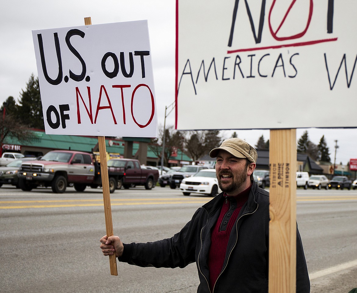 Bjorn Handeen protests the Trump Administration consideration of using military action in response to the alleged use of chemical weapons in Syria on April 7. (LOREN BENOIT/Press)