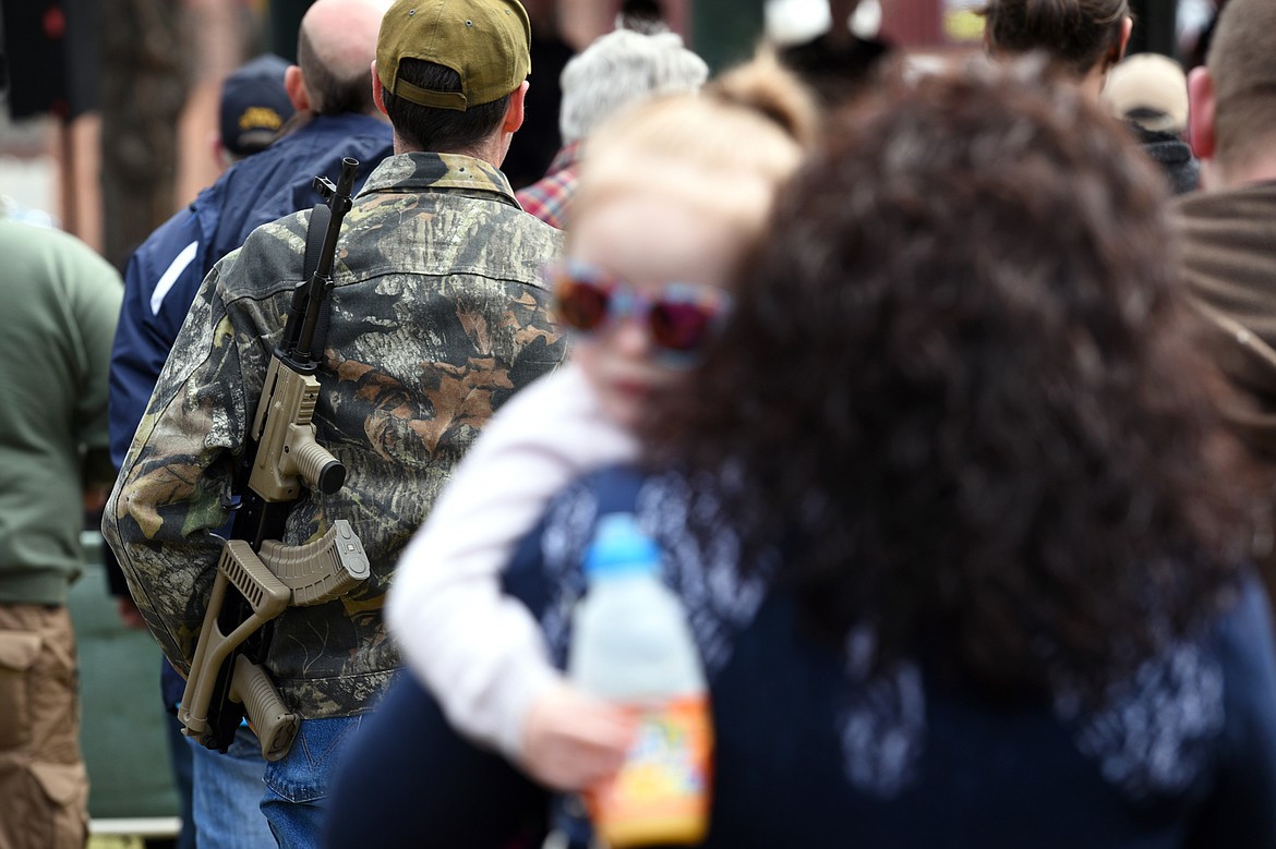 Attendees listen to speakers at the &#147;Rally for Our Rights&#148; pro-gun demonstration at Depot Park in Kalispell on Saturday. (Casey Kreider/Daily Inter Lake)