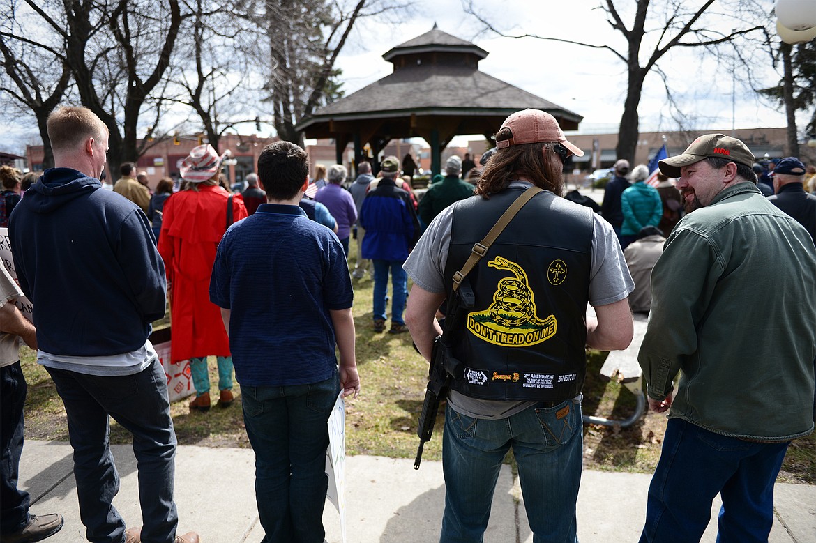 Attendees listen to speakers at the &#147;Rally for Our Rights&#148; pro-gun demonstration at Depot Park in Kalispell on Saturday. (Casey Kreider/Daily Inter Lake)