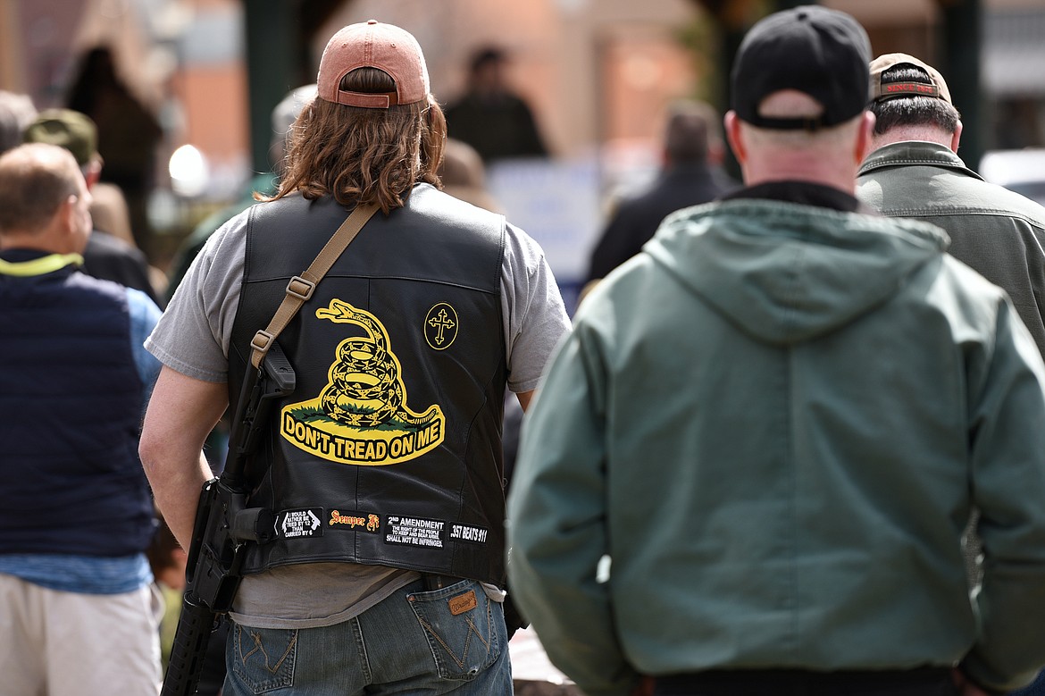 Attendees listen to speakers at the &#147;Rally for Our Rights&#148; pro-gun demonstration at Depot Park in Kalispell on Saturday. (Casey Kreider/Daily Inter Lake)