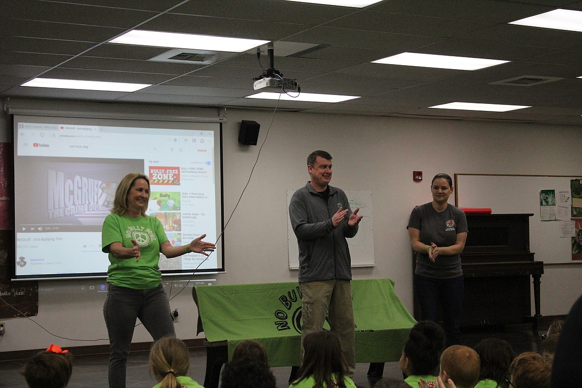 Photo by TANNA YEOUMANS
Mary Jane Riva, CEO of Pizza Factory, D.J. Cartwright, and Greg Kissee, owners of the local restraunt, were excited, and had the fourth grade students excited to lead the school in an anti-bullying movement, beginning with a friendship bench, custom T-shirts, and bracelets.