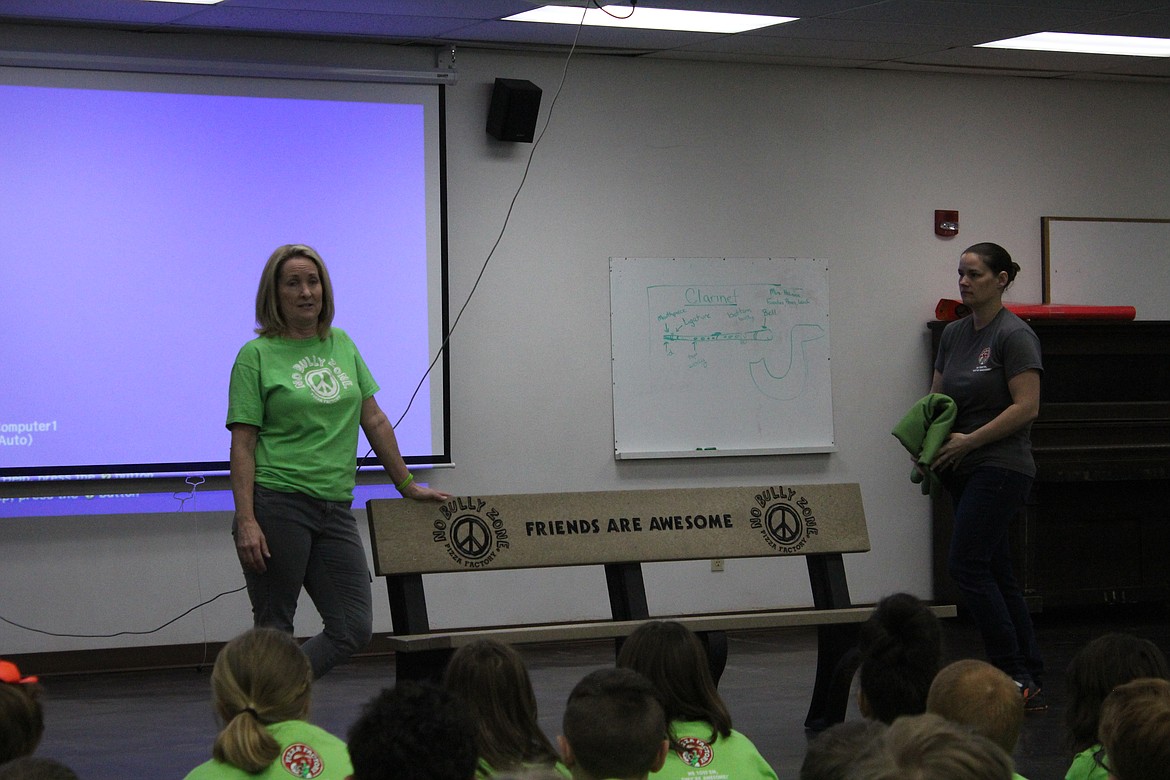 Photo by TANNA YEOUMANS
Mary Jane Riva and D.J. Cartwright stand by the friendship bench provided by Pizza Factory during a recent anti-bullying presentation at Valley View Elementary School.