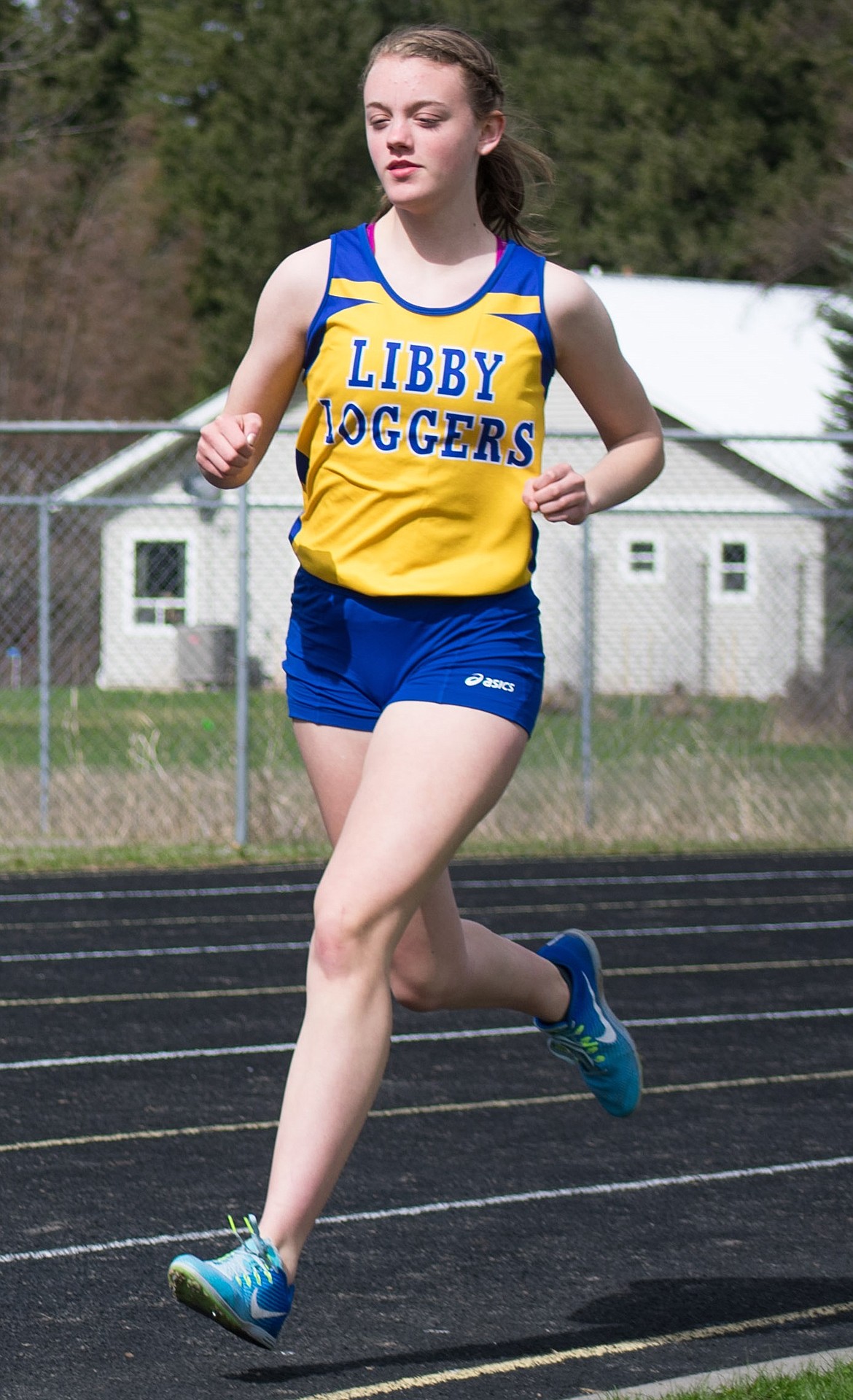 Pictured here running the 1,600m where she placed second with a 6:18.08, Libby junior Lauren Thorstenson also placed first in the 3,200m with a 13:16.47. (Ben Kibbey/The Western News)