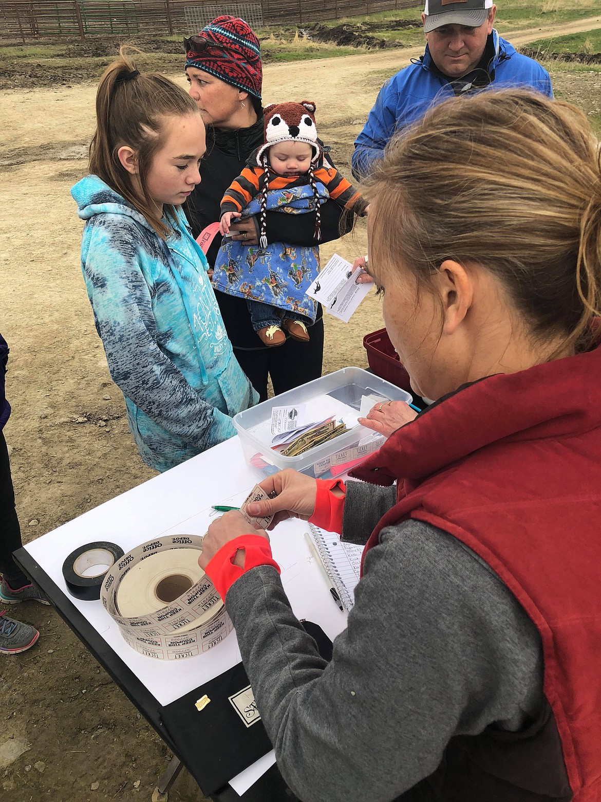 Elena&#146;s mom Tammy McAllister checks in the runners before the event kicked off (Erin Jusseaume/ Clark Fork Valley Press)