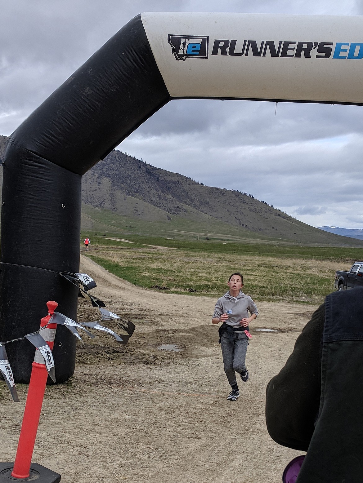 5k ladies winner Kylee Neimeyer runs across the finish line with an official time of 29.00 minutes (photo supplied)