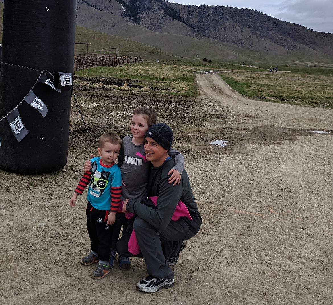 The one mile runners and walkers are all smiles after they crossed the line. Bode, Paisley and Ryan Pleniger. Paisley also won the 1 mile (photo supplied)