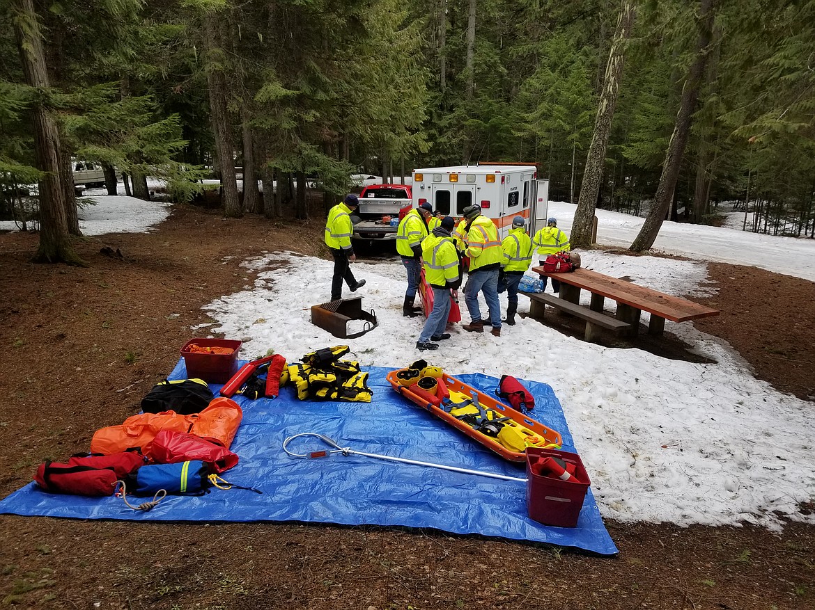 Photo by MANDI BATEMAN
Firefighters get their gear together for ice rescue training at Robinson Lake.