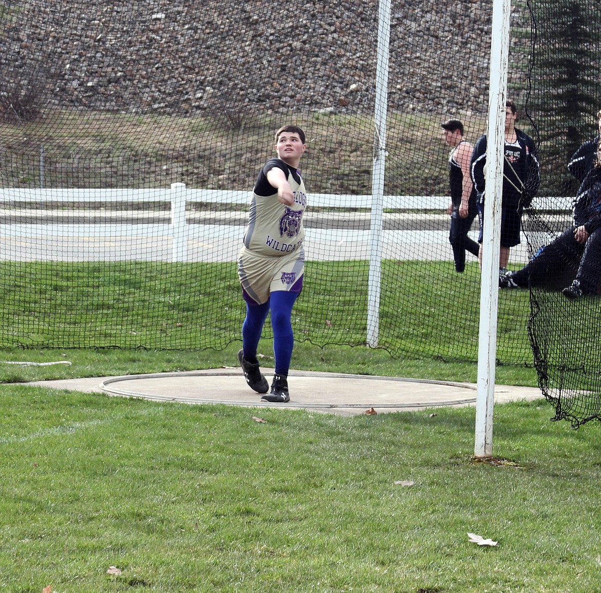 Photo by Josh McDonald
Kellogg thrower Austin Marsan watches the discus fly.