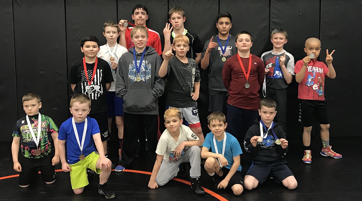 Courtesy photo
Team Real Life wrestlers participated in the last of the Washington Little Guys Wrestling League&#146;s tournament, held at West Valley High in Spokane. In the front row from left are Jacob Kunzi, 3rd; Hunter Patzer, 3rd; Matthew Hamilton, 1st and 2nd; Tristen Mendenhall, 3rd and Paxton Purcell, 1st and 3rd; second row from left, Diesel Thompson, 2nd; Jonathan Hansen, 1st; Damion Hamilton, 1st; Briley Arnett, 2nd; Trey Smith, 1st and AJ Spain, 2nd; and back row from left, Connor McCarroll, 3rd; Tyler Lafser, 2nd; Keanyn DeGroat, 3rd and Jose Laguna, 1st. Not pictured but placing: Bradley Mason, 3rd.