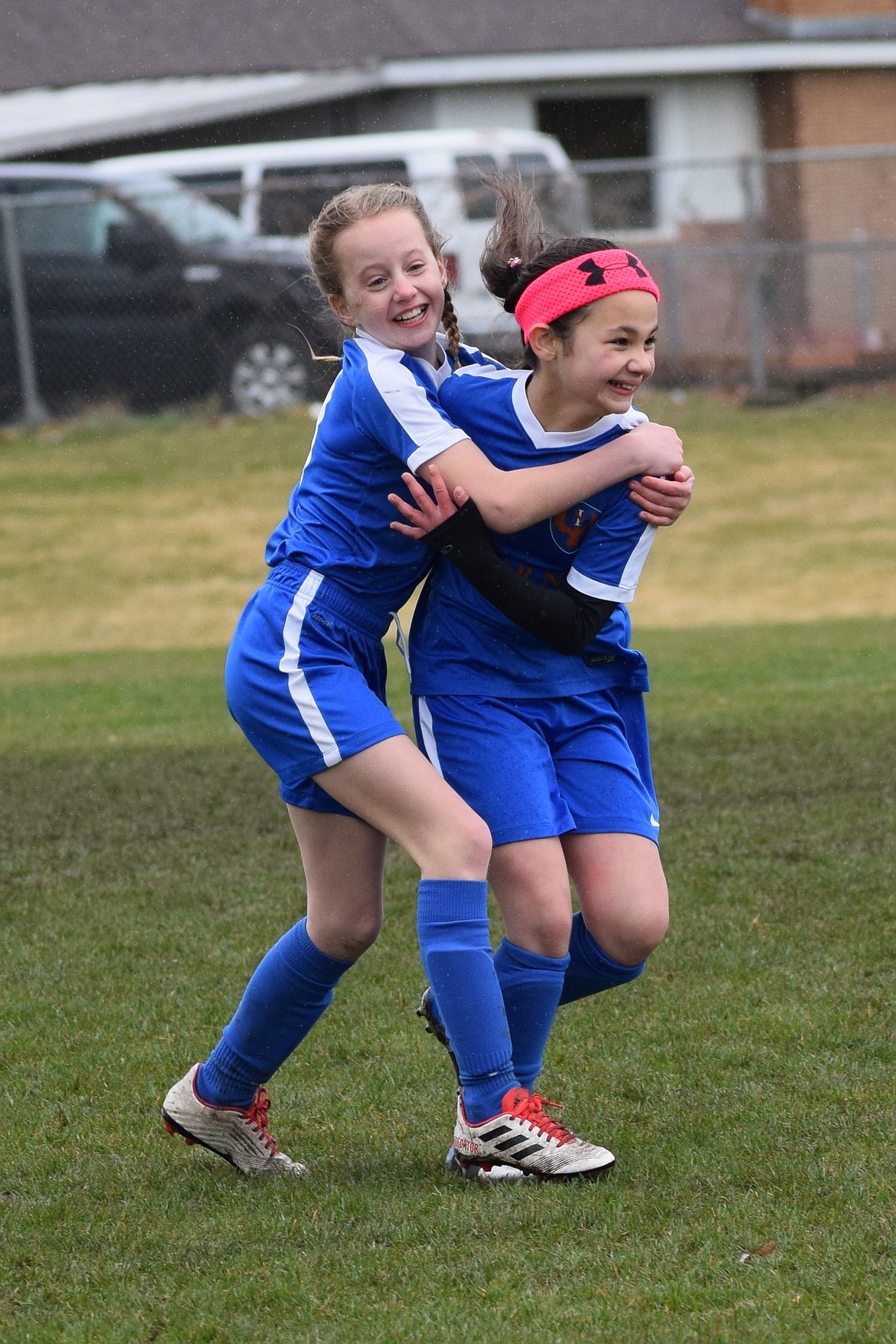 Lily Bole, left, celebrates with teammate Isabella Berzoza after Berzoza scores for the North Idaho Inferno FC Hartzell girls &#146;07 team in a March 25 win over the Spokane Foxes Pumas FC 07 Ostby-Marsh.
Courtesy photo