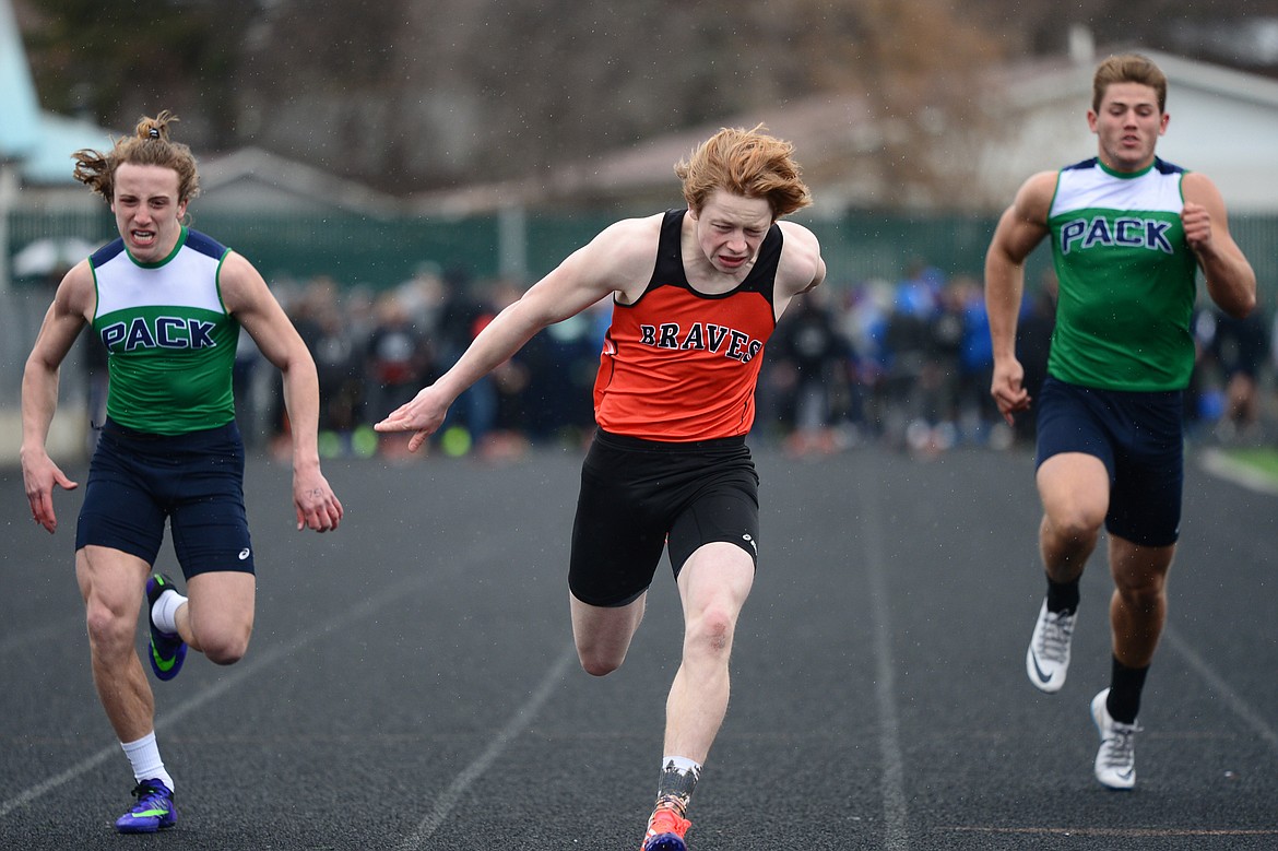 Flathead&#146;s Chance Sheldon-Allen crosses the finish line in the boys&#146; 100 meter with a time of 11.71 at the Kalispell Invitational at Legends Stadium on Tuesday. (Casey Kreider/Daily Inter Lake)