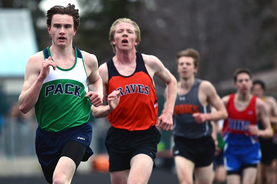 Glacier&#146;s Joseph Vandenbos outpaces Flathead&#146;s Keaton Fischer for first in the boys&#146; 3,200 meter at the Kalispell Invitational at Legends Stadium on Tuesday. (Casey Kreider/Daily Inter Lake)