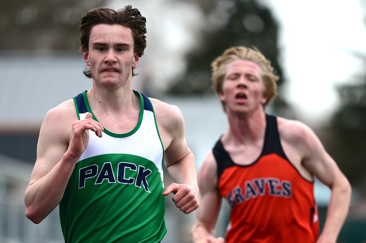 Glacier&#146;s Joseph Vandenbos outpaces Flathead&#146;s Keaton Fischer for first in the boys&#146; 3,200 meter at the Kalispell Invitational at Legends Stadium on Tuesday. (Casey Kreider/Daily Inter Lake)