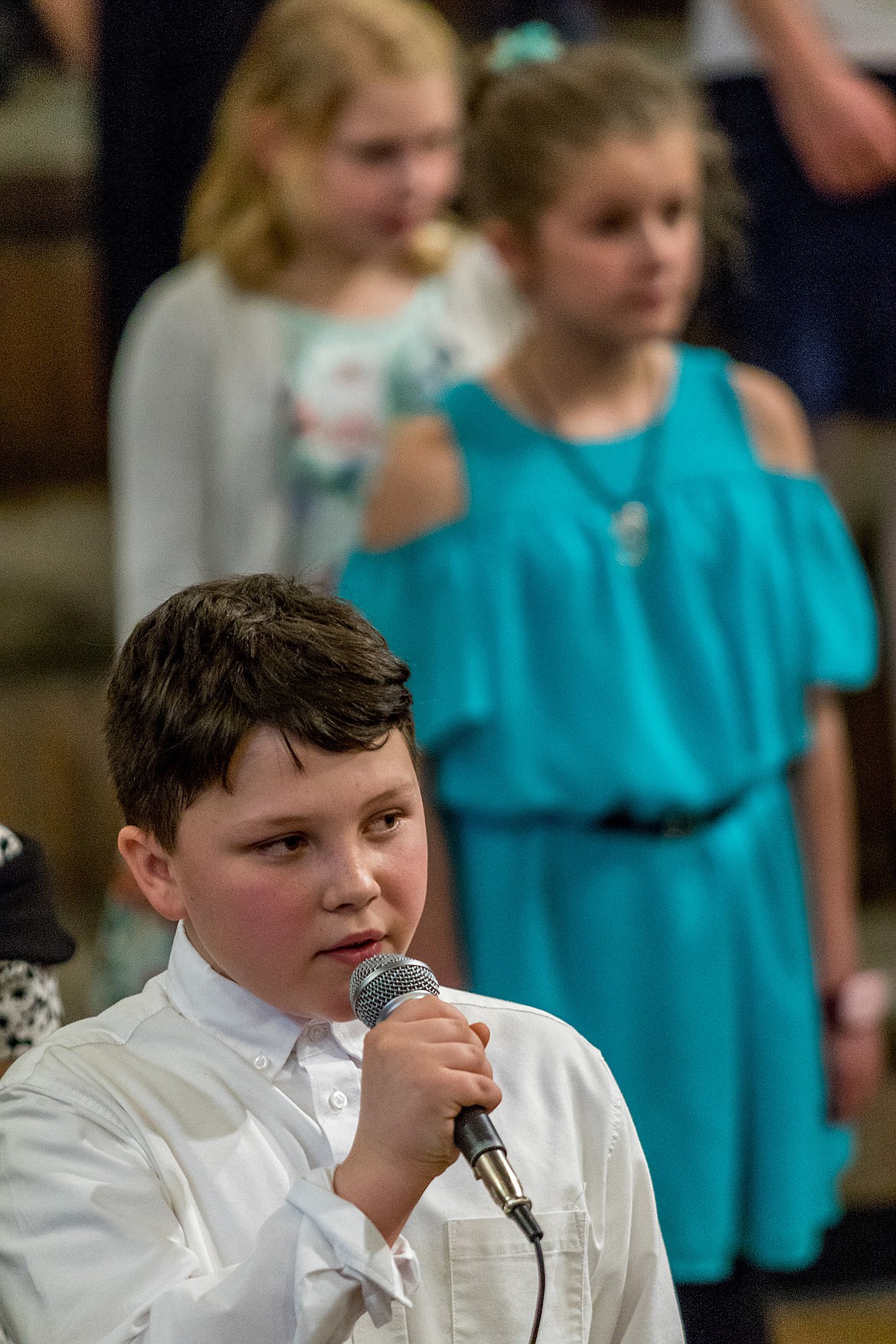 Nicholas Silbermann sings during a dinner and auction benefitting the Libby Children’s Select Choir Friday evening at Libby Elementary School. (John Blodgett/The Western News)