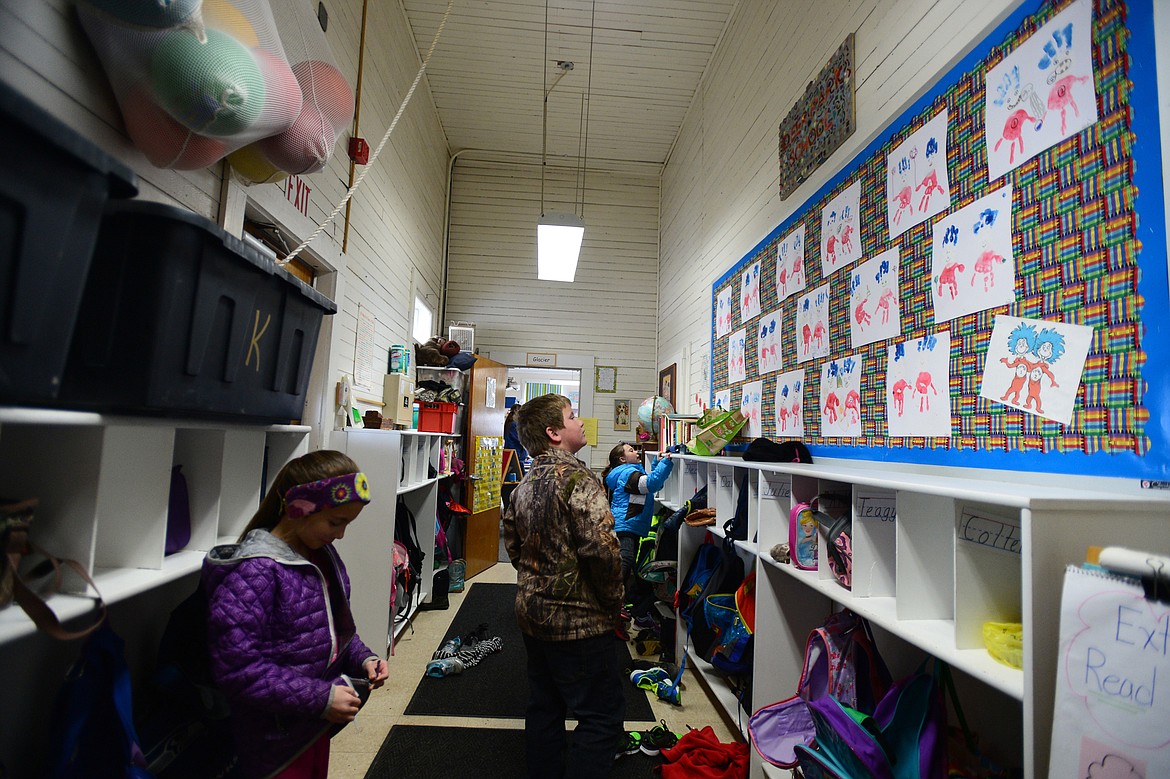 Elementary students at their cubbies inside the Deer Park School on Thursday, April 5. (Casey Kreider/Daily Inter Lake)