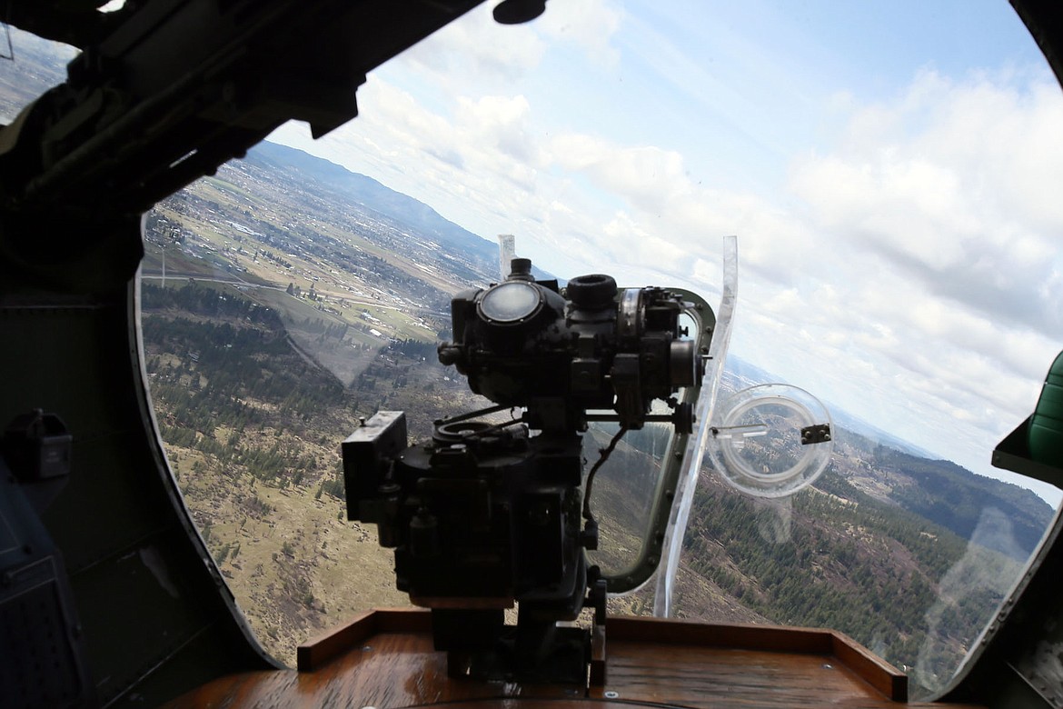 Crawl under the cockpit and into the plexiglass nose of the &#147;Madras Maiden&#148; this weekend, where World War II-era bombardiers plotted bombing runs and manned .50-caliber machine guns in the chin turret. (JUDD WILSON/Press)