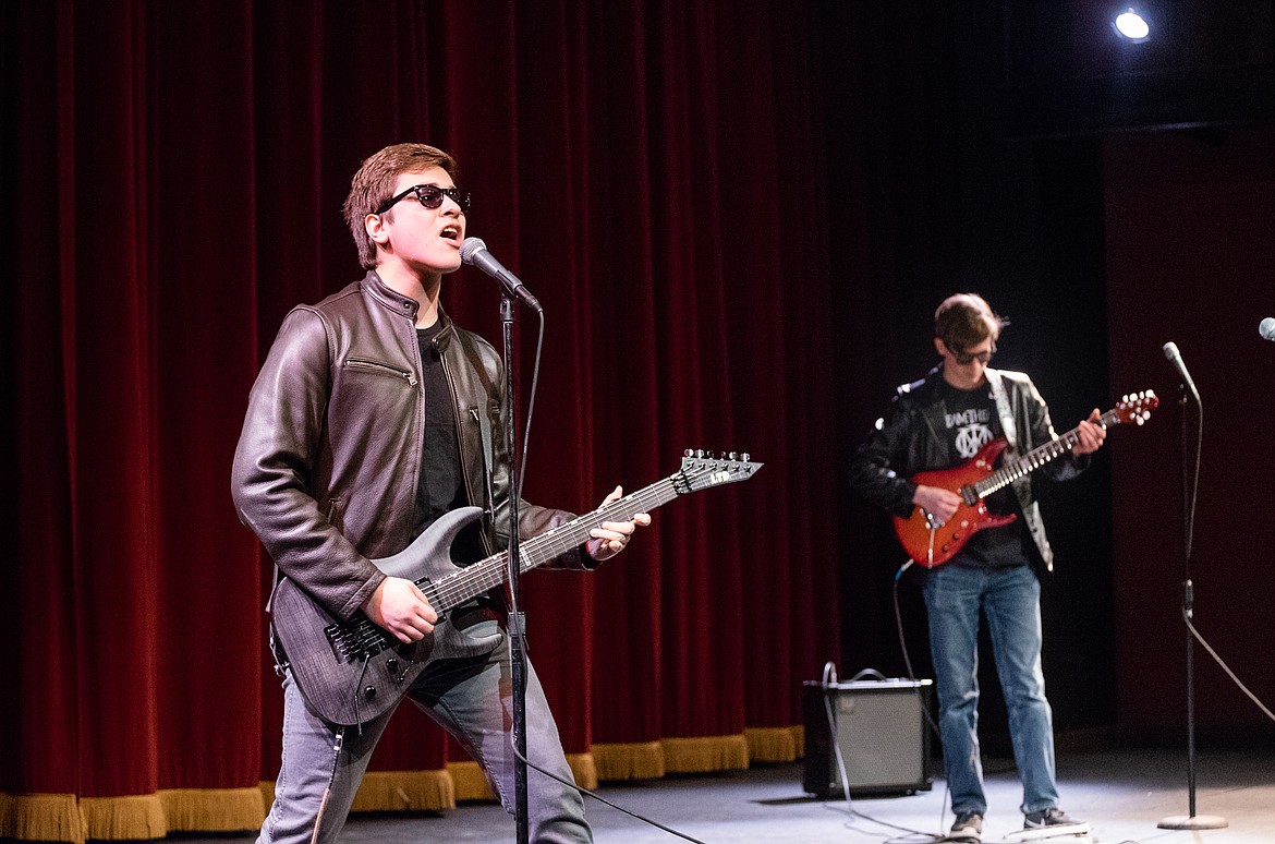 Matthew Perez and Port Nugent rock out during the Whitefish High School Talent Show on Thursday.