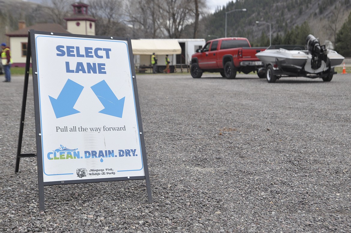 ALL WATERCRAFT travelling through the Ravalli area must stop at an inspection site before launching into the Flathead Basin. As the tourism season picks up, more inspectors will be on hand to look boats, kayaks, canoes and paddleboards over. (Ashley Fox/Lake County Leader)