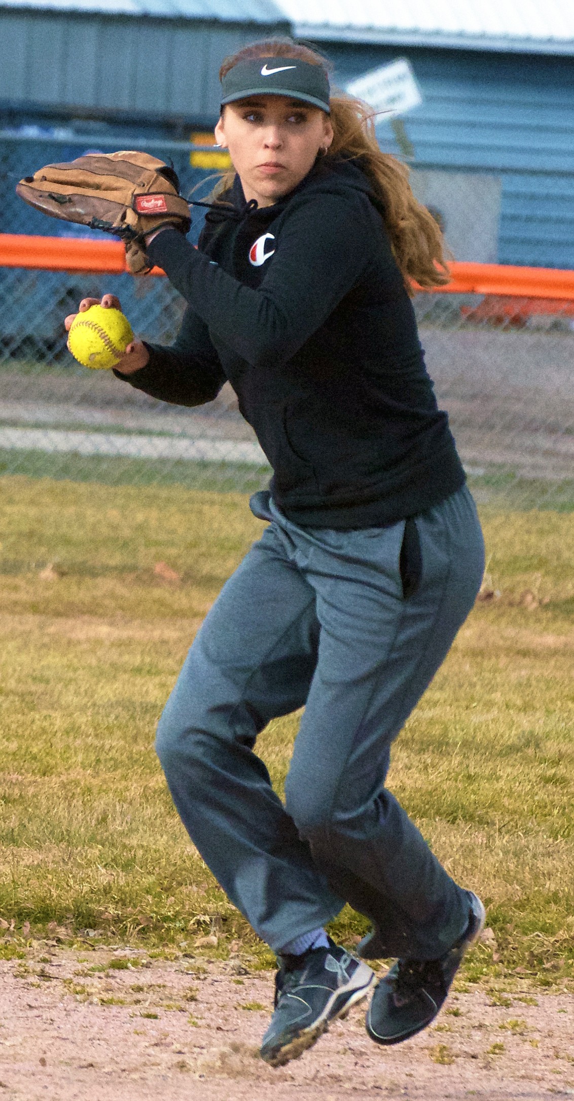 THE RONAN High School softball infielder Katlyn Santos works on fielding during field practice at Ronan High School softball field. (Jason Blasco/Lake County Leader)