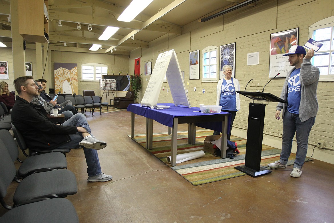 Kootenai County Democratic Party field organizer Matt Kilburn encourages everyone to follow through with a promise to vote Saturday morning during the Democratic caucus in the Human Rights Education Institute. (DEVIN WEEKS/Press)