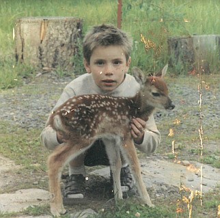 Oscar Bressie poses with a fawn near his family&#146;s cabin in Emida in 2008, one day before the Idaho Department of Health and Welfare removed him and his brother and sister from their father&#146;s care. 

Courtesy photo