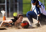 T-Wolves, Trojans split twinbill