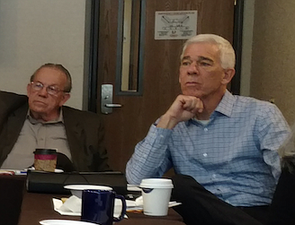 Kootenai County Task Force on Human Relations attorney Norm Gissel, left, and Idaho Human Rights Commission president Brian Scigliano listen to a speaker Friday morning during a meeting between the commission, officers of the Task Force and the director of Coeur d'Alene Tribal Employment Rights Office. The meeting was held as one of the commission's first steps to re-establish itself around the state and strengthen relationships with human rights leaders in Idaho communities. (DEVIN WEEKS/Press)