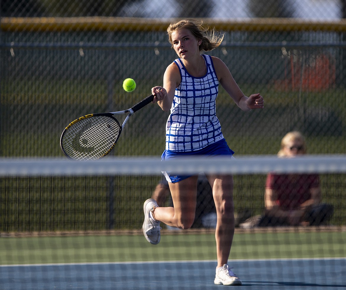 Coeur d&#146;Alene&#146;s Rachel Jeske hits a volley to Lake City&#146;s Kiki Cates in the number two singles match Wednesday afternoon at Coeur d&#146;Alene High School. (LOREN BENOIT/Press)