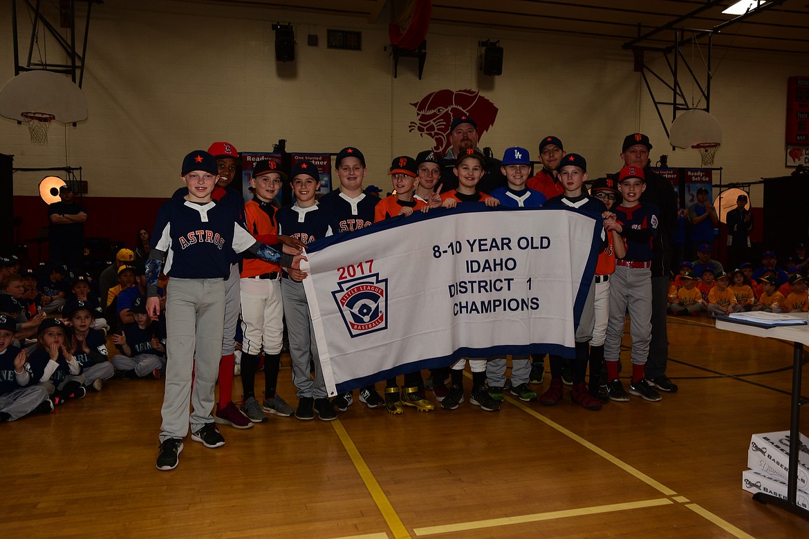 Courtesy photo
Coeur d'Alene Little League honored its 10U Idaho District 1 champions from last season at its Opening Day ceremonies April 7 at Canfield Middle School. In the front row from left are Tyler Voorhees, Cason Miller, Hudson Kramer, Lars Bazler, Owen Mangini, Zach Bell, Declan McCahill, Kyle Johnson, Travis Usdrowski, Owen Field, Tanner Frankin and Mark Holecek; and back row from left, coach Thor Bazler, coach Tony Vorhees and manager Robin Franklin.