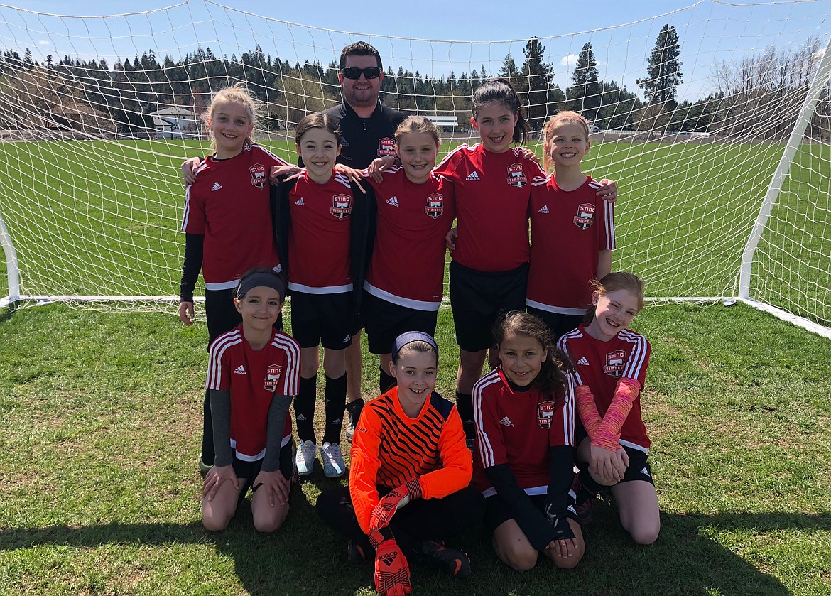 Courtesy photo
The Sting Timbers FC Girls 08 Yellow soccer team traveled to Moscow United on Saturday and won 4-0. Ella Pearson, Kamryn Kirk, Isabella Grimmett and Ellie Moss each had a goal. On Sunday the Sting lost 3-2 to the Spokane Foxes Pumas. Macy Walter and Izzie Grimmett each had a goal for the Sting. Macy Walters and Hannah Shafer were in goal for both games. In the front row from left are Isabella Grimmett, Macy Walters, Alli Carrico and Teagan Slusher; and back row from left, Libby Montgomery, Ellie Moss, Kamryn Kirk, Hannah Shafer, Ella Pearson and coach Tony Grimmett.