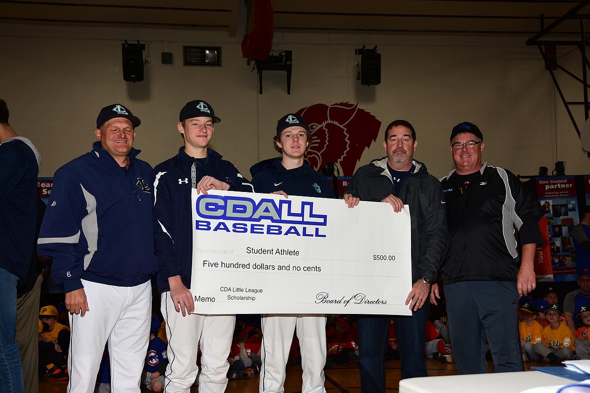 Courtesy photo
The 2018 Coeur d'Alene Little League scholarships were awarded to Kyle Manzardo and Zach Sensel, both of Lake City High School. From left are Paul Manzardo, Kyle Manzardo, Zach Sensel, Chris Sensel and Coeur d'Alene Little League President Jeffrey Smith.