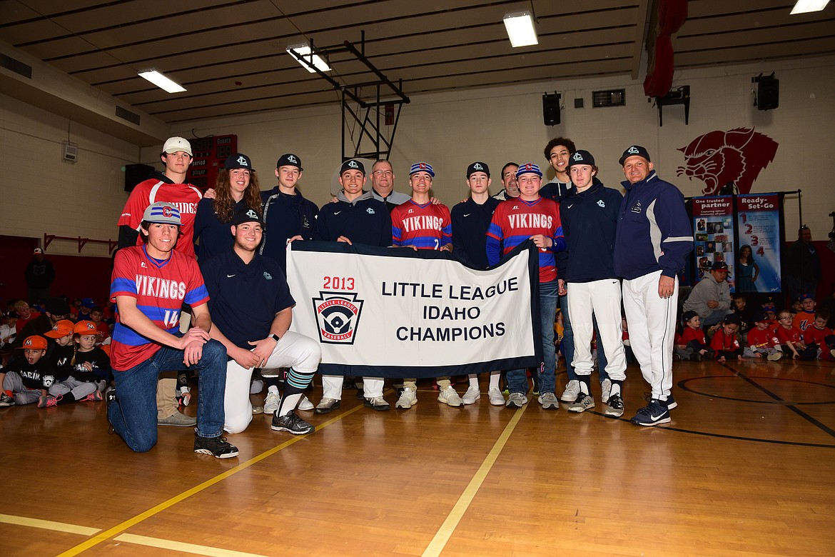 Courtesy photo
Members of the 2013 Coeur d'Alene Little League all-star team that competed in the Northwest Regional in San Bernardino, Calif., gathered recently at Coeur d'Alene Little League's Opening Day ceremonies April 7 in the Canfield Middle School gym, as part of the program entitled &quot;Looking to the future while remembering the past.&quot; Kneeling from left are Cody Davenport, Brandon Gay; and standing from left, Logan Nosworthy, Bennett Cunningham, Kyle Manzardo, Conner Conigliaro, Donny Gay (Coeur d'Alene Little League President), Zach Mackimmie, Bridger Rinaldi, Chris Sensel (assistant coach), Colt Rowley, Anton Watson, Zach Sensel and Paul Manzardo (head coach). Not pictured are Kobe Sims and Kevin Rinaldi (assistant coach).