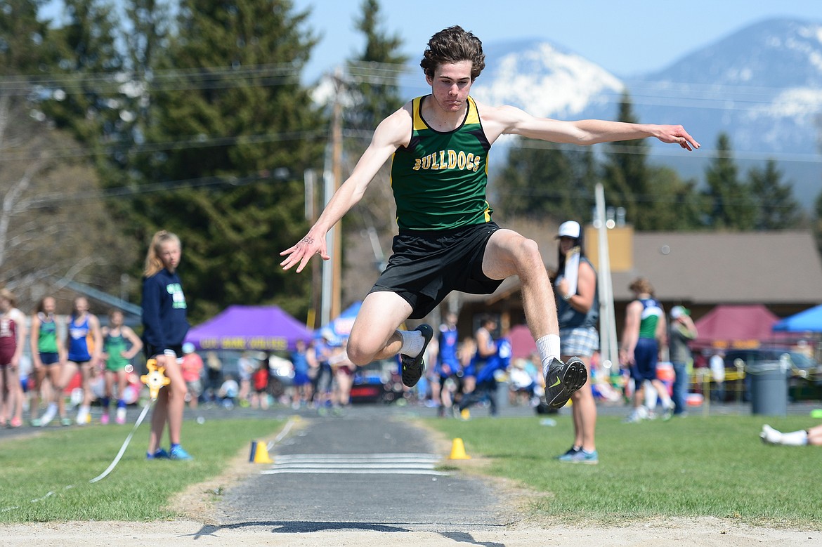 Whitefish's Sam Menicke competes in the boys triple jump at the A.R.M. Invitational at Whitefish High School on Saturday. (Casey Kreider/Daily Inter Lake)