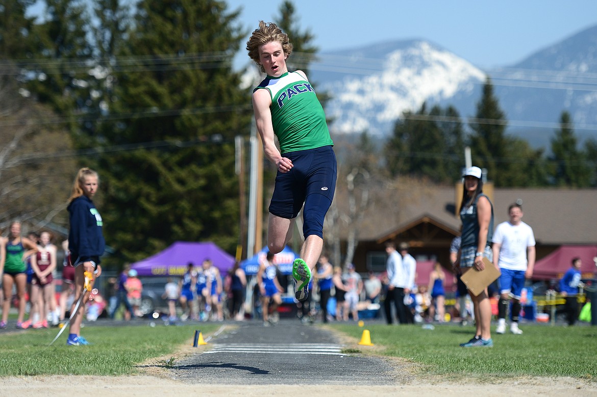 Glacier High School's Caden Harkins competes in the boys triple jump at the A.R.M. Invitational at Whitefish High School on Saturday. (Casey Kreider/Daily Inter Lake)