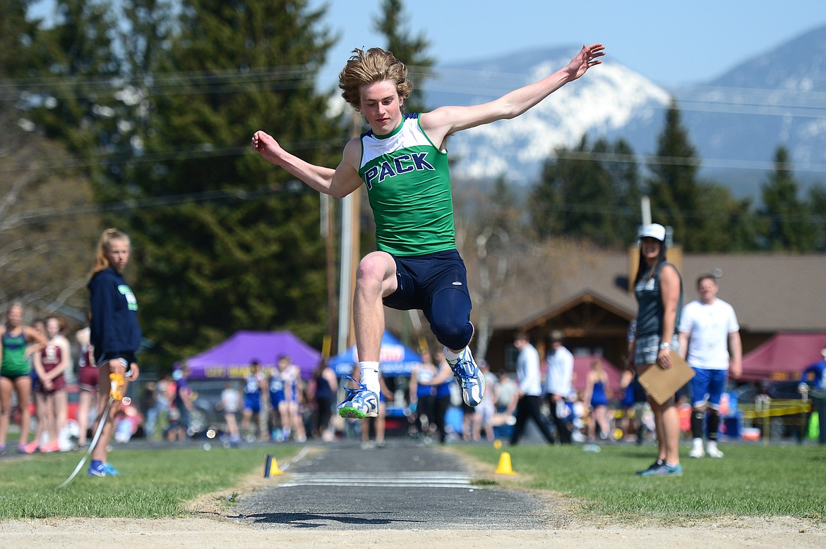 Glacier High School's Caden Harkins competes in the boys triple jump at the A.R.M. Invitational at Whitefish High School on Saturday. (Casey Kreider/Daily Inter Lake)